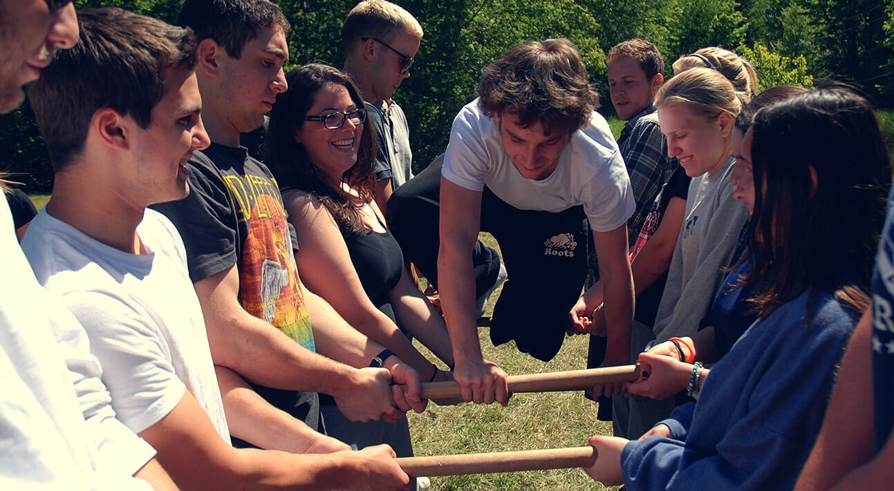 A group of campers cooperating in an activity